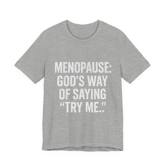 Menopause Tee — “Menopause: God’s Way of Saying ‘Try Me’” Short Sleeve Shirt
