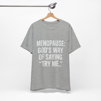 Menopause Tee — “Menopause: God’s Way of Saying ‘Try Me’” Short Sleeve Shirt
