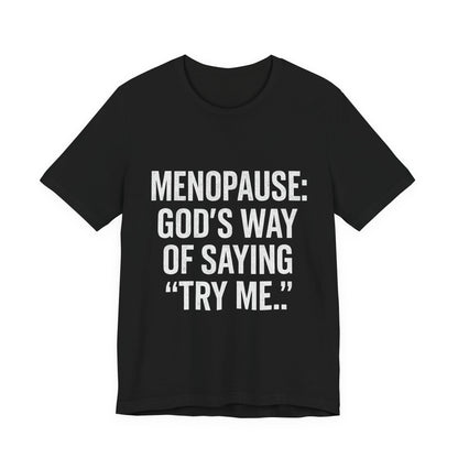 Menopause Tee — “Menopause: God’s Way of Saying ‘Try Me’” Short Sleeve Shirt